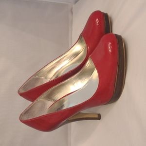 Stunning and sexy size 6 patent red heels